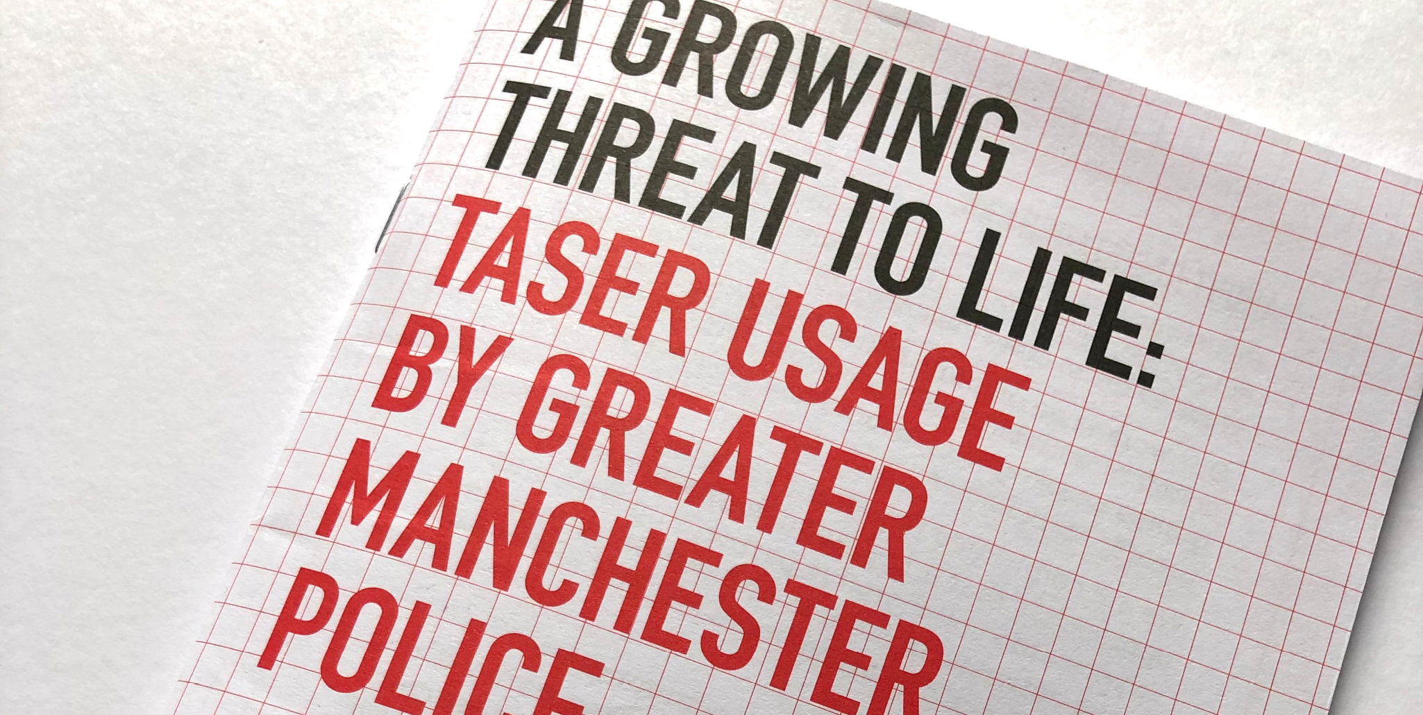 A growing threat to life report cover, bold graphic design in red and black